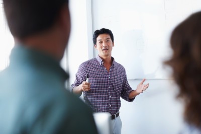 man leading meeting
