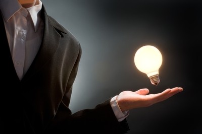 Man light bulb in hand.jpg